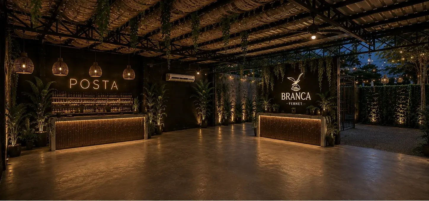 Salón interior de POSTA con dos barras iluminadas